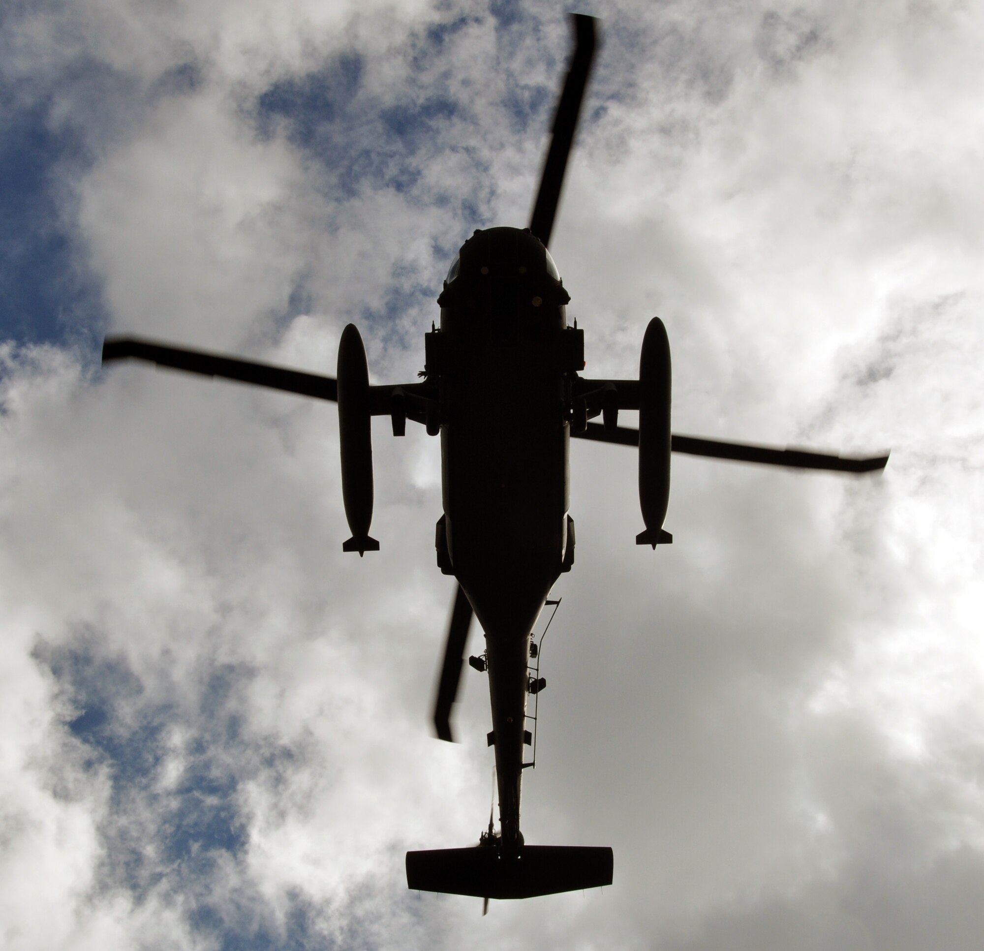 A UH-60 Blackhawk helicopter assigned to Joint Task Force-Bravo's 1-228th Aviation Regiment flies overhead during an operation as part of Joint Task Force-Bravo's Culminating Exercise (CULEX), Dec. 3, 2013.  For the CULEX, more than 90 members of Joint Task Force-Bravo deployed to the Department of Gracias a Dios, Honduras, to conduct both real-world and exercise operations.  (U.S. Air Force photo by Capt. Zach Anderson)