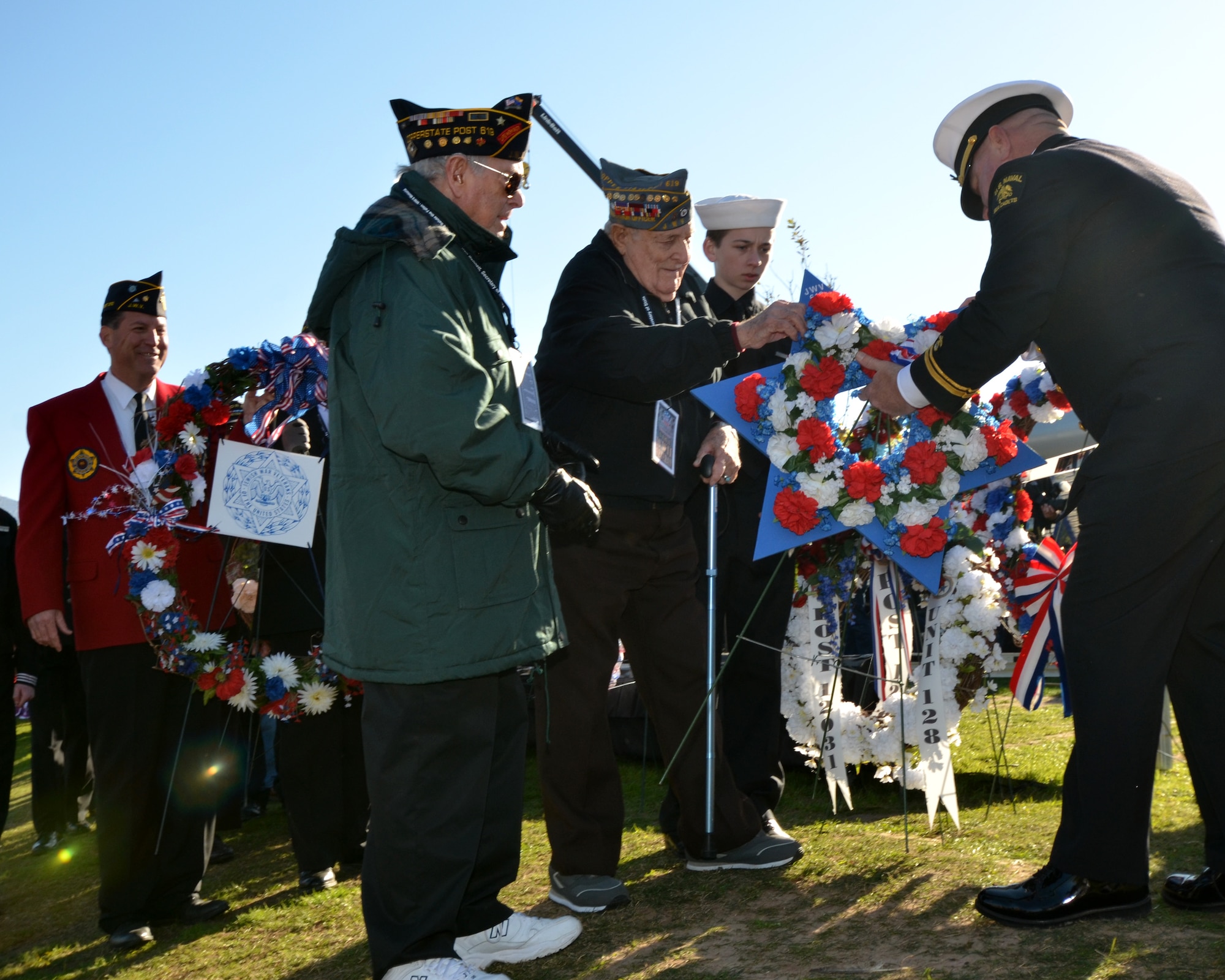 The Arizona World War II memorial, ”Salute the Fallen”, was dedicated during a ceremony Dec. 7th 2013 at Wesley Bolin Park, Phoenix.  The memorial is a tribute to the fallen service members of World War II, which presents historic barrels from the USS Arizona and USS Missouri as a tribute to all the United States service members who sacrificed their lives for our freedom. (U. S. Air National Guard photo by Senior Airman Rashaunda Williams/Released)


