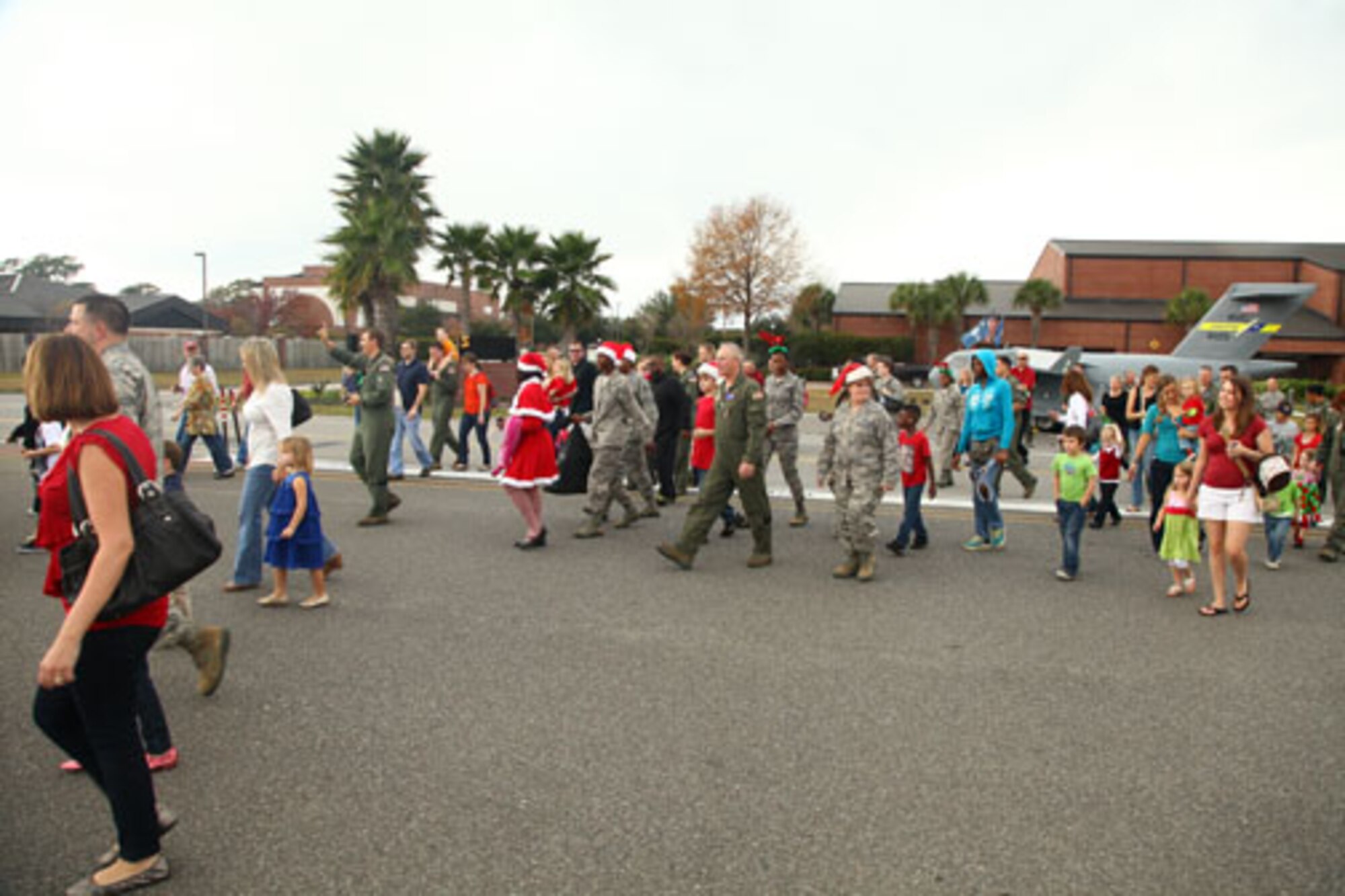 Santa visits the 315th Airlift Wing, Joint Base Charleston - Air Base, S.C. Saturday, Dec. 7 during the annual Santa flight.  The event provides an opportunity for airmen and thier families to share valuable time together during the holiday season. (U.S. Air Force photo by Staff Sgt. Rashard Coaxum/released)