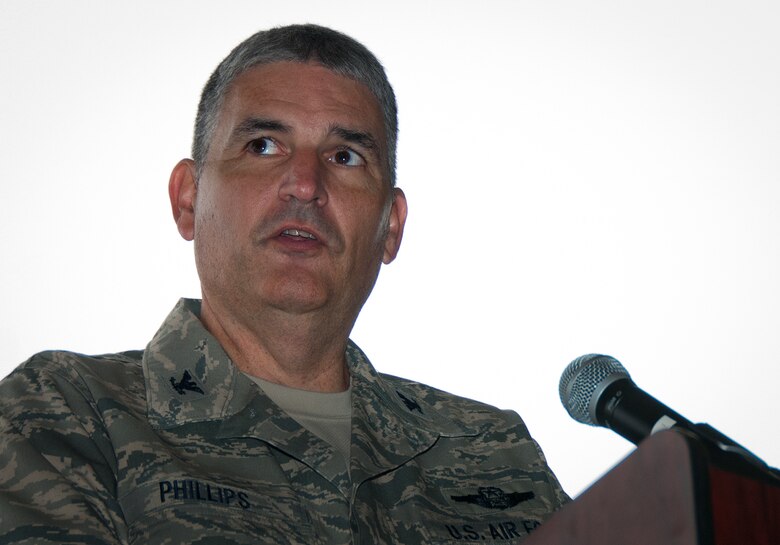 Col. James M. Phillips speaks to his wing during an assumption of command ceremony that installed him as commander of the 919th Special Operations Wing Dec.  7, at Duke Field, Fla.  Phillips is responsible for organizing, training, equipping, and maintaining the wing’s special operations forces, ensuring unit readiness for worldwide deployments in support of combatant commands.  (U.S. Air Force photo/Tech. Sgt. Jasmin Taylor)