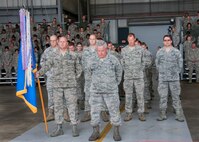 Col. Ken Honaker, the 919th Special Operations Maintenance Group commander, bows his head with the group during invocation at the assumption of command ceremony of the Air Force Special Operations Wing at Duke Field, Dec. 3. (U.S. Air Force photo/Tech. Sgt. Jasmin Taylor)