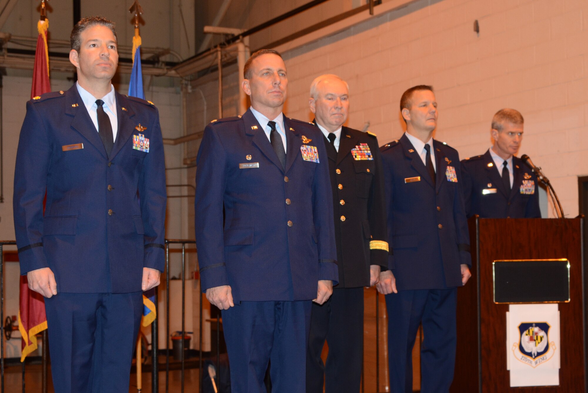 Maj. Chris Cisneros, 104th Fighter Squadron Instructor Pilot, and Lt. Col. Paul C. Zurkowski, 104th Fighter Squadron commander, are awarded the Distinguised Flying Cross for duty performed while deployed to Southwest Asia.  The awards were given during a ceremony at Warfield Air National Guard base on December 8, 2013.  (Air National Guard photo by TSgt. David Speicher/RELEASED)