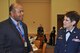 Odis Blueitt, Defense Health Agency Chief of Program Operations and Col. Deborah Hodge, 433rd Aeromedical Staging Squadron commander, converse prior to his induction as an Honorary Commander with the 433rd Airlift Wing. The purpose of the Honorary Commanders' Program is twofold: It allows our community partners to gain awareness of our important military mission, and it allows our military members and their units to learn more about the communities in which we live.   (U.S. Air Force Photo by Tech. Sgt. Carlos J. Trevino)