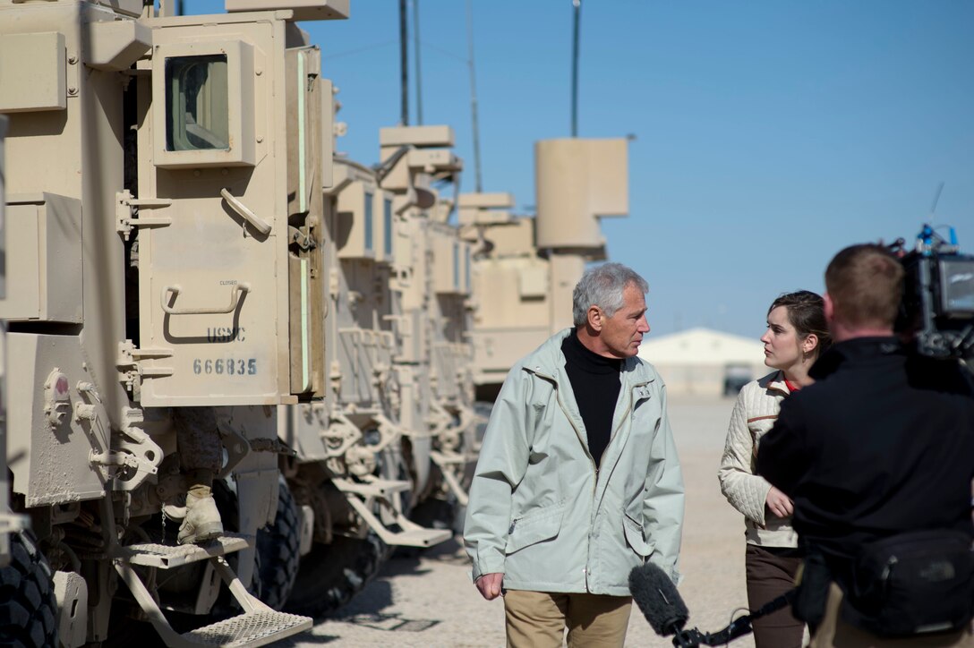 U.S. Defense Secretary Chuck Hagel is interviewed by CBS News’ Margaret Brennan on Camp Leatherneck in Helmand province, Afghanistan, Dec. 8, 2013. Hagel discussed meeting with troops on the ground. 