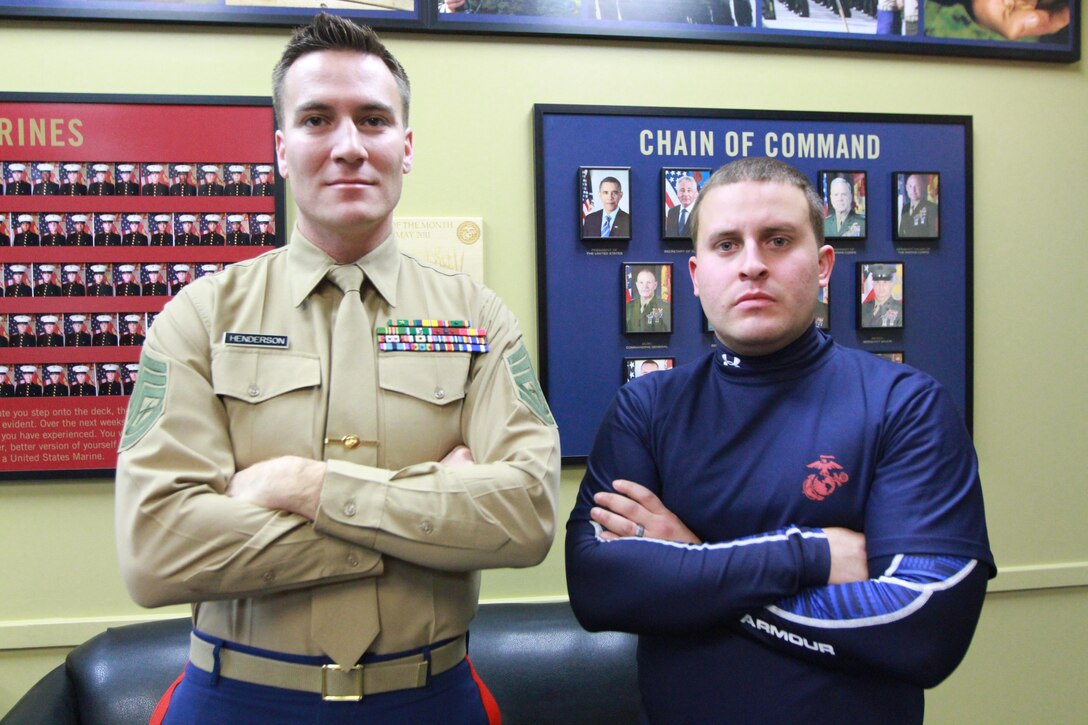 Gunnery Sgt. Joe Henderson, left, and David Flores, right, pose for a photograph inside the Marine recruiting substation Nov. 23.  Flores, a Rhode Island resident, is enrolled in the Marine Corps Delayed Entry Program and is scheduled to ship to recruit training at Marine Corps Recruit Depot Parris Island, S.C., in May.