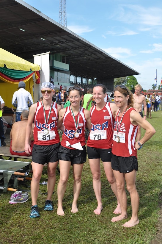 Team USA Women finish 3rd in team competition during the 2013 CISM World Military Marathon Championship in Paramaribo, Suriname on 23 November.  From left to right:  CPT Samantha Wood (Army); CPT Nicole Solana (Army); Maj Elissa Ballas (USAF); Lt Col Brenda Schrank (USAF)