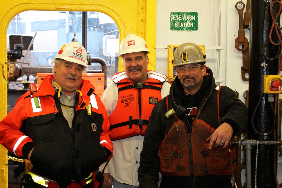 (Left to Right) USACE Dredging Inspector John Bensch, USACE Project Manager Charlie Myers and Norfolk Dredging Company Deck Captain Daniel Cahoon aboard the Dredge Essex in November of 2013.  The U.S. Army Corps of Engineers' Philadelphia District and its contractor Norfolk Dredging Company completed maintenance dredging on the Delaware River between Philadelphia and Trenton in December of 2013. 