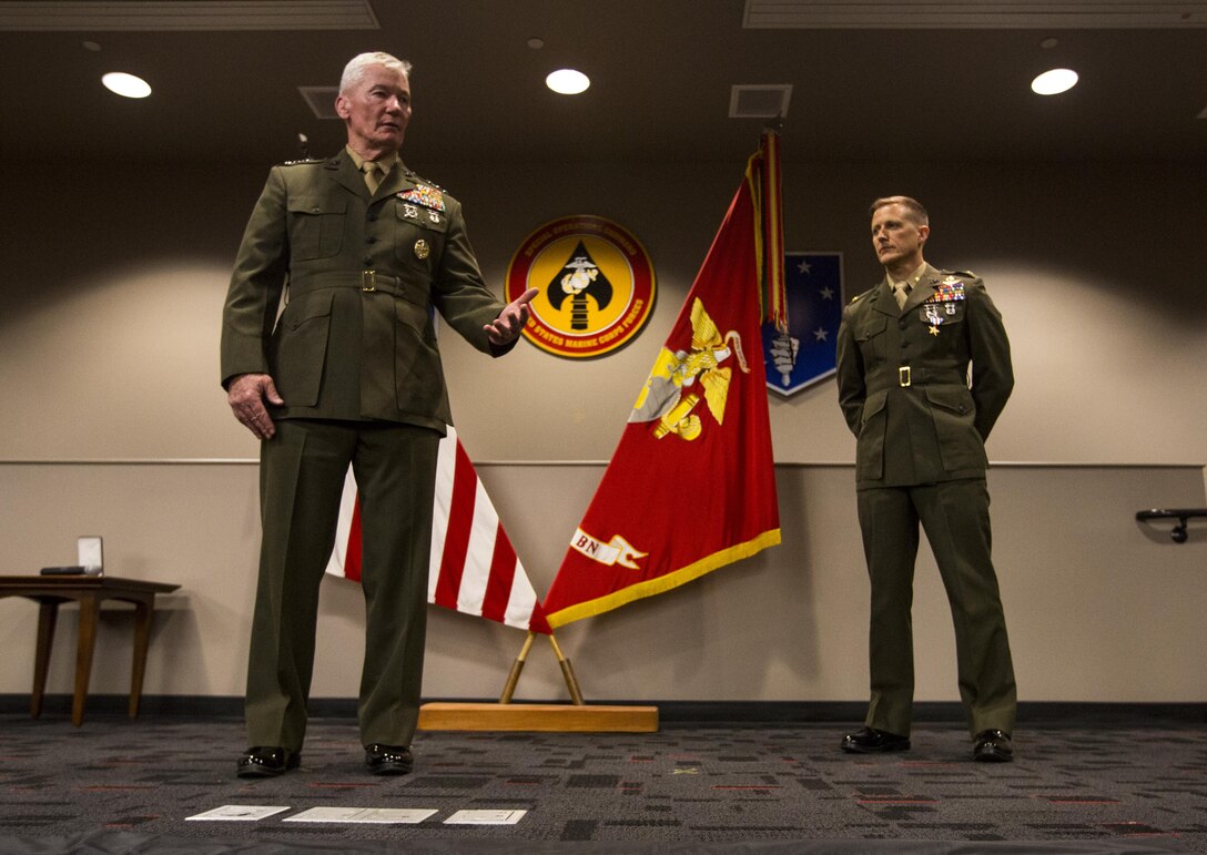 The I Marine Expeditionary Force commanding general, Lt. Gen. John A. Toolan speaks to Marines and media during the ceremony honoring Maj. Robb McDonald and his actions at Camp Bastion, Afghanistan. McDonald receives the Silver Star, the nation’s third-highest combat valor award, for his role in repelling an enemy attack inside Camp Bastion, Afghanistan. McDonald was serving as the executive officer of Marine Attack Squadron 211, III Marine Aircraft Wing. The ceremony took place at the 1st Marine Special Operations Battalion command building at Camp Pendleton Dec. 9. 

According to the award citation on Sept. 14, 2012 15 insurgents infiltrated Camp Bastion and attacked the coalition forces stationed there. McDonald took charge after the commanding officer, Lt. Col. Christopher Raible, was mortally wounded. He risked his life to lead Marines away from a building that could have become a death trap had the troops remained there. He later shot and killed one attacker and directed two helicopter attacks that killed several other insurgents.