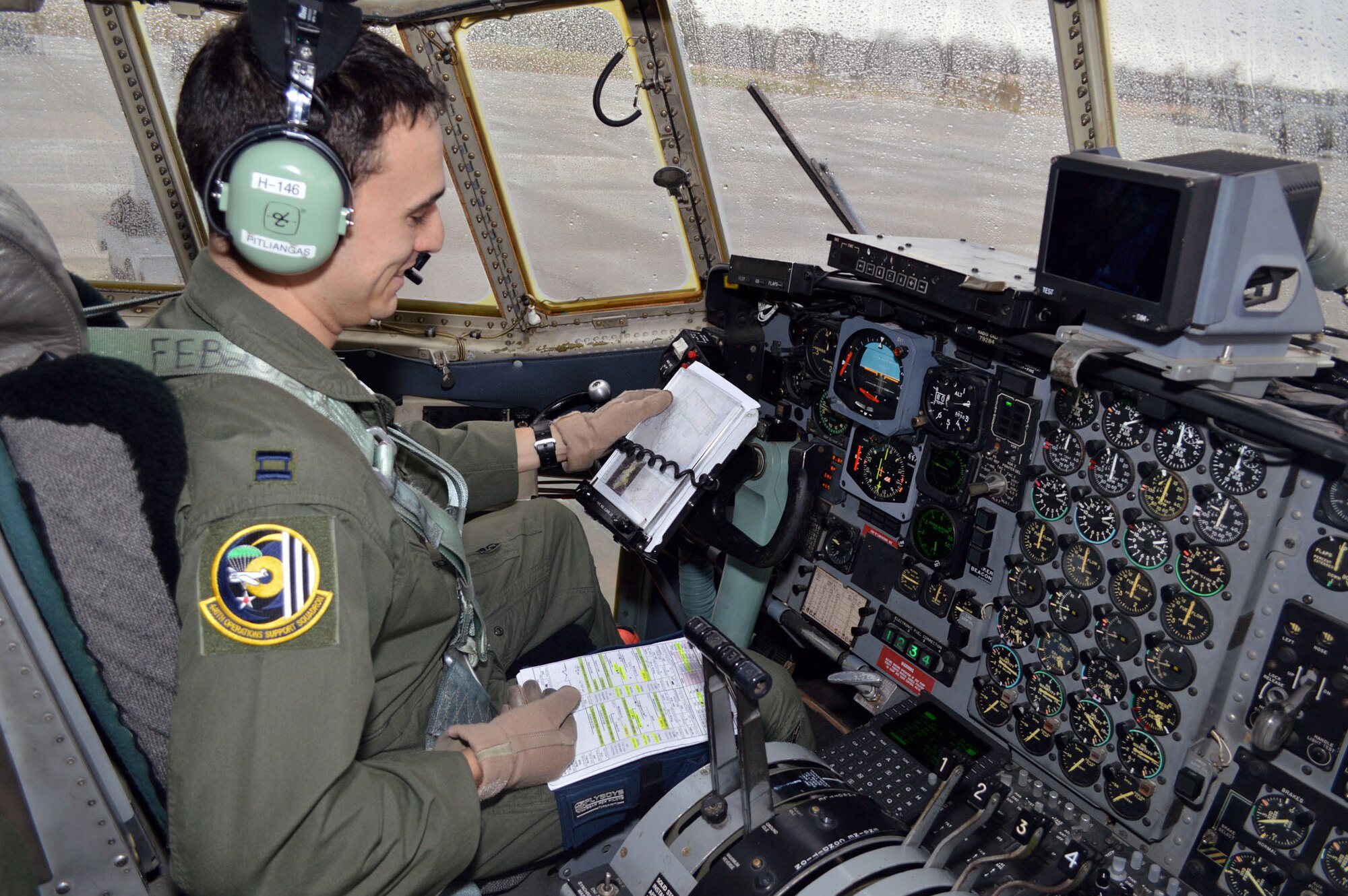 U.S. Air Force Capt. Mark Pitliangas, a C-130H Hercules pilot from the 440th Airlift Wing, prepares to taxi his aircraft on Green Ramp during Operation Toy Drop 2013, Pope Army Airfield, N.C. on Dec. 7. Operation Toy Drop is an annual U.S. Army Civil Affairs and Psychological Operations Command (Airborne) sponsored event. The main purpose is to gather toys donated by Fort Bragg Soldiers and distribute them to local children who might otherwise not receive a toy for the holidays. A large airborne operation is also part of Operation Toy Drop. Paratroopers will get a chance to train with a jumpmaster from one of nine countries participating this year. This allows them to earn foreign airborne or “jump” wings. (U.S. Air Force photo/Marvin Krause) 