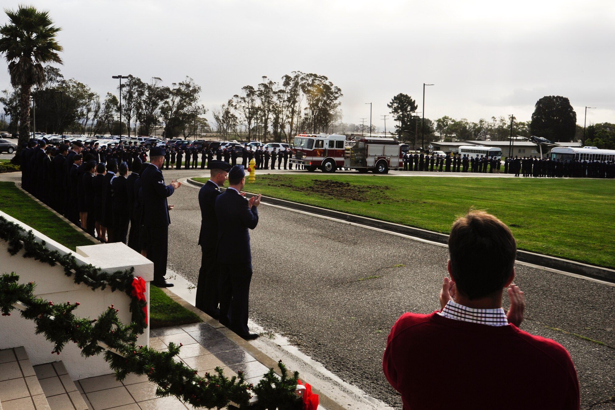 VANDENBERG AIR FORCE BASE, Calif. – Nearly 200 Airmen wait to escort children into the Pacific Coast Club for Operation Kids Christmas here Saturday, Dec. 7, 2013. OKC is an annual event, organized and run by a private organization, in which about 200 local children are brought on base and given the opportunity to play games, meet Santa and enjoy the companionship of volunteer military members (U.S. Air Force photo/ Airman 1st Class Yvonne Morales)