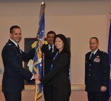Lisa O'Briant, Provenir Manager of Admininstrative Services, assumed command of the 733rd Training Squadron from Col. Jeffrey T. Pennington, 433rd Airlift Wing commander during the Honorary Commander Induction Ceremony Dec. 7 at the Gateway Club on Joint Base San Antonio-Lackland. The Honorary Commander program educates  local businesses and civic communities about the Air Force Reserve mission in national defense and encourages employers to support employees who are members of the Air Force Reserve and specifically the 433rd AW.  (U.S. Air Force Photo by Tech. Sgt. Carlos J. Trevino)