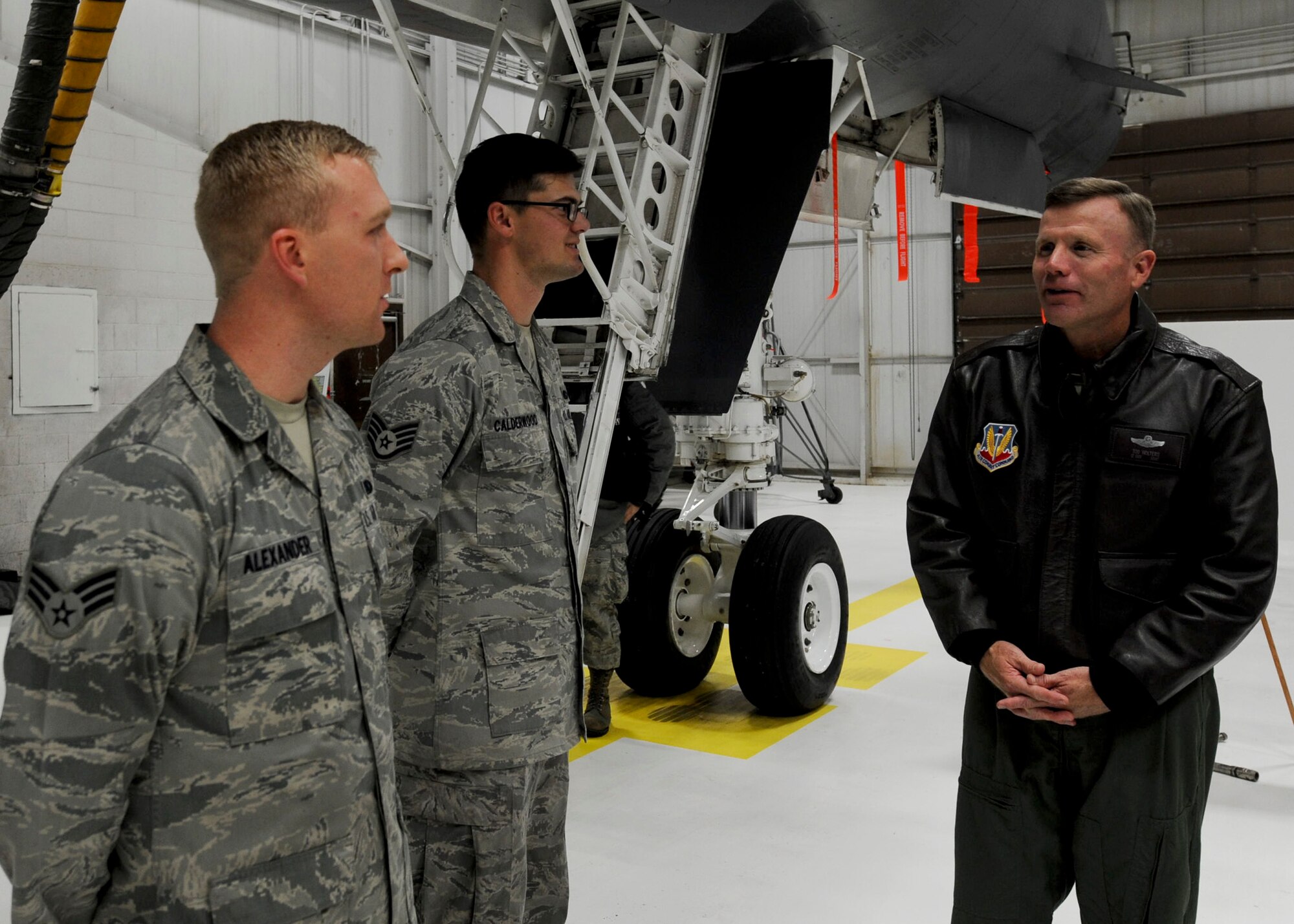 Lt. Gen. Tod Wolters, 12th Air Force (Air Forces Southern) commander, talks with Airmen from the 28th Aircraft Maintenance Squadron during a tour at Ellsworth Air Force Base, S.D., Dec. 3, 2013. During his visit, Wolters hosted an all call for the base where he encouraged Ellsworth Airmen to uphold Air Force standards and be vigilant in their efforts to protect their wingmen and families. (U.S. Air Force photo by Senior Airman Anania Tekurio/Released)