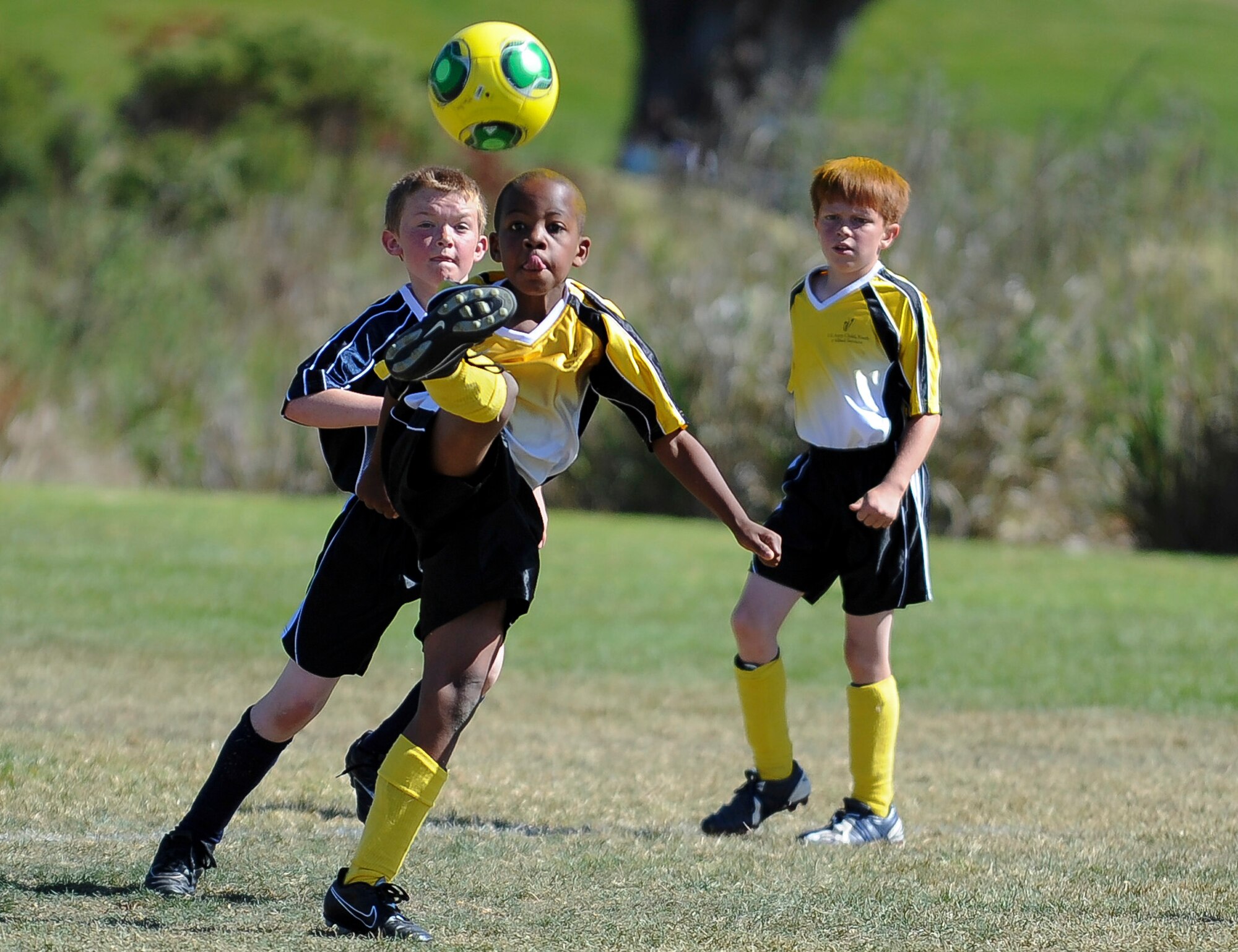 U.S. Air Force military dependents play soccer at the Hayes Park Soccer Field, Seaside, Calif., Oct. 05, 2013. The Presidio of Monterey Youth Sports and Fitness organizes youth activities for eligible military dependents throughout Monterey. (US Air Force photo/Master Sgt. Elizabeth Concepcion)