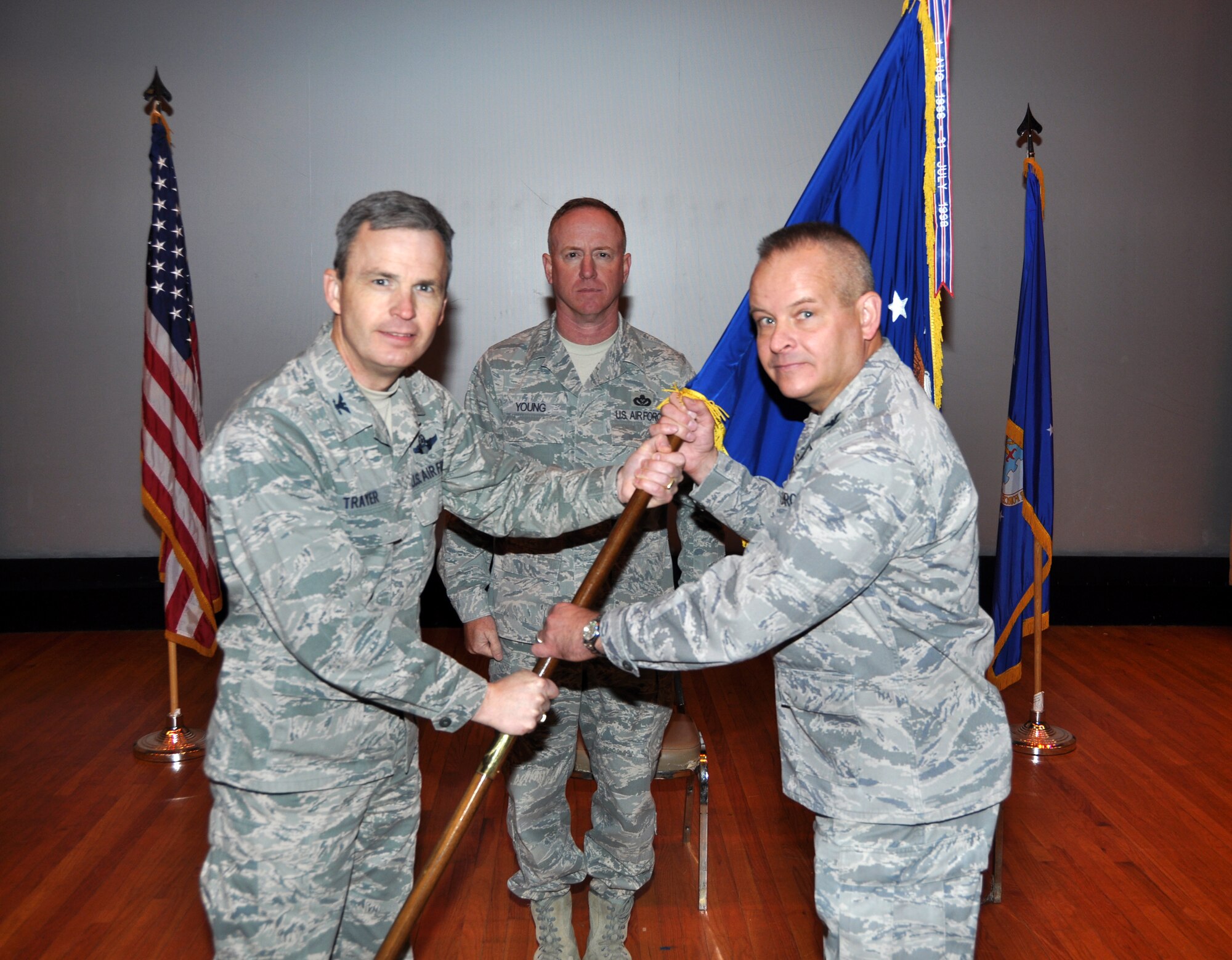 Colonel Joseph M. Revit assumes command as he receives the 507th Mission Support Group guidon from acting 507th Air Refueling Wing commander, Col. Kevin Trayer. (U.S. Air Force Photo/Senior Airman Mark Hybers)    
