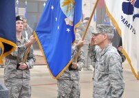 Brig. Gen. Bob LaBrutta, Joint Base San Antonio and 502nd Air Base Wing commander, salutes during the playing of the national anthem during the 502nd Air Base Wing transformation ceremony at Joint Base San Antonio-Fort Sam Houston Dec. 4.  (U.S. Air Force photo by Steve Elliott)