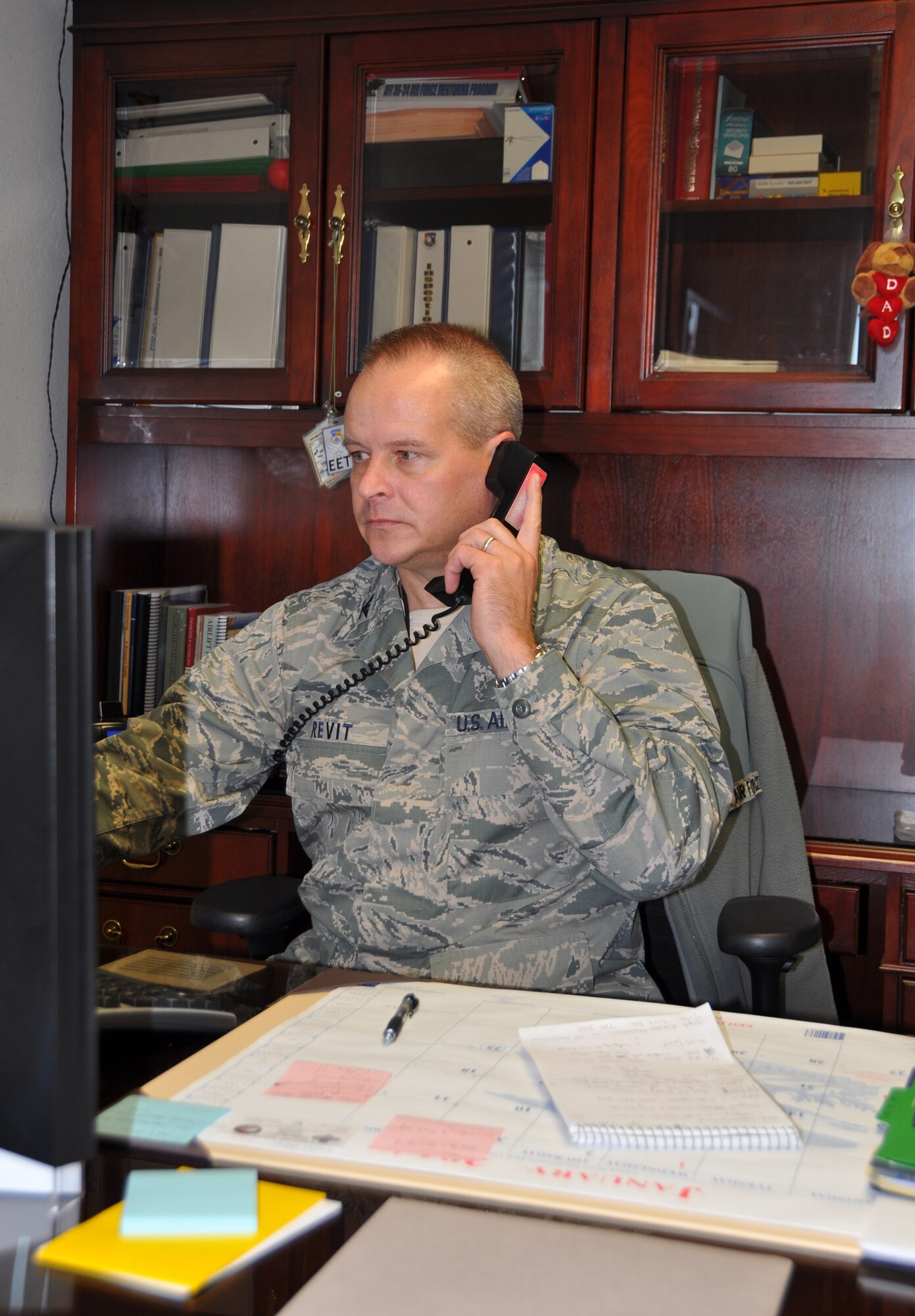 The new 507th Mission Support Group Commander, Col. Joseph M. Revit, works from his new office, Dec. 3 at Tinker Air Force Base, Okla.  (U.S. Air Force Photo/Maj. Jon Quinlan)      