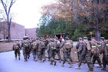 Sailors with 2nd Dental Battalion, 2nd Marine Logistics Group marched approximately six miles roundtrip during an Authorized Dental Allowance List exercise aboard Camp Lejeune, N.C., Dec. 6, 2013. Sailors traveled three miles to the exercise location with flak jackets and day packs, then assembled and disassembled a tent, and got hands on with expeditionary equipment. (U.S. Marine Corps photo by Lance Cpl. Shawn Valosin)