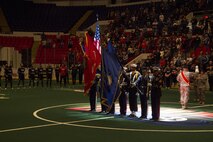 Sgts. Deon Craft and Nathan Krohn, Marines with Recruiting Station Milwaukee, present the colors alongside members of the Army, Navy and Air Force, during the Milwaukee Wave opening home game Dec. 7, 2013. The Milwaukee wave designated the home opener as a “Military Appreciation Game,” taking a moment of silence for those lost at Pearl Harbor on Dec. 7, 1941.