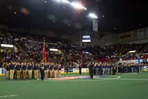 Nearly 40 poolees from Recruiting Station Milwaukee took the oath of enlistment alongside their fellow future servicemembers during the Milwaukee Wave opening home game Dec. 7, 2013. The Milwaukee wave designated the home opener as a “Military Appreciation Game,” taking a moment of silence for those lost at Pearl Harbor on Dec. 7, 1941.