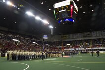 Nearly 40 poolees from Recruiting Station Milwaukee took the oath of enlistment alongside their fellow future servicemembers during the Milwaukee Wave opening home game Dec. 7, 2013. The Milwaukee wave designated the home opener as a “Military Appreciation Game,” taking a moment of silence for those lost at Pearl Harbor on Dec. 7, 1941.