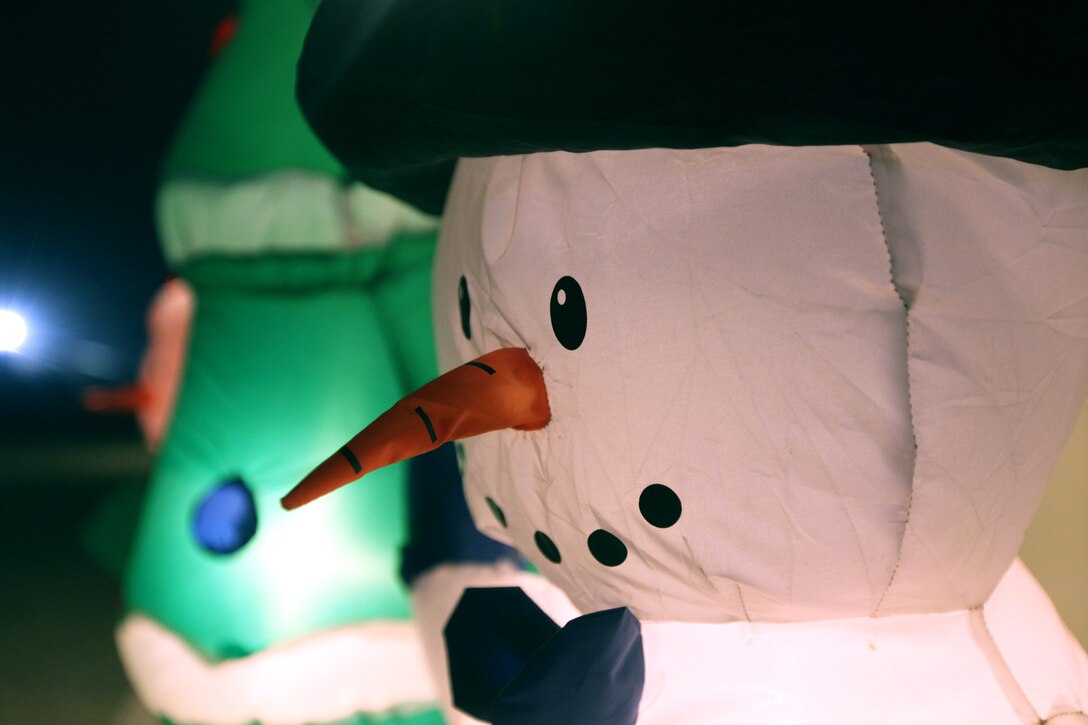 Marines at Camp Leatherneck, Afghanistan keep the spark of Christmas alive by decorating trees and their workplaces with lights and ornaments. Marines here owrk through the Christmas holiday, but the decorations help boost morale of the service members on base.

"I simply love it," said Staff Sgt. Freeman J. Lowe, motor transport chief with detachment 1, Regimental Combat Team 2. "It's a beautiful reminder of the traditions of holiday and family events that we fight to keep free!"