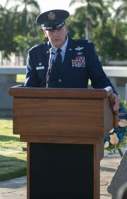 Col. Johnny Roscoe, 15th Wing commander, speaks at the December 7th Remembrance Ceremony at Hickam Field, Dec. 7, 2013. The ceremony, which recognized the 72nd anniversary of the Dec. 7, 1941, attack on the base that killed 190 Airmen and civilians, was attended by four survivors, as well as a host of family members of the deceased. Hickam has honored the fallen, as well as the survivors, each year for the last 60 years on December 7th. (U.S. Air Force photo/Staff Sgt. Terri Paden)