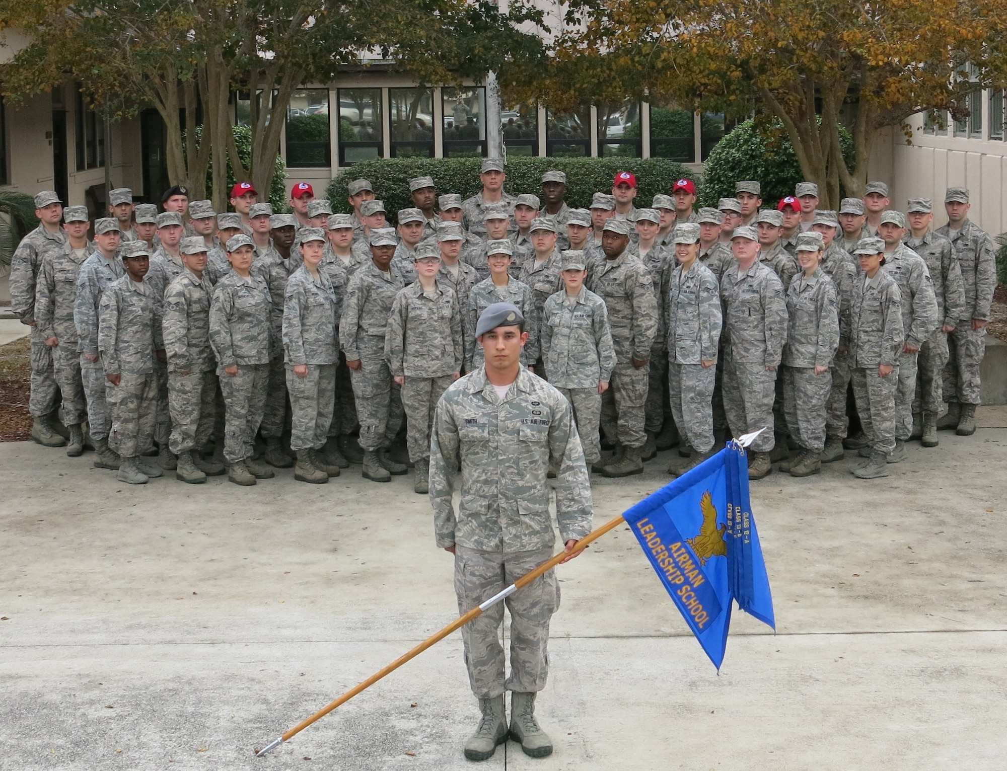 Staff sergeants and senior airmen from Class 14-A of the Vincent Airman Leadership School pose in front of the school at Hurlburt Field, Fla. The class graduated from ALS during a ceremony at the Soundside Club at Hurlburt Field, Fla., Dec. 5, 2013. (Courtesy photo)