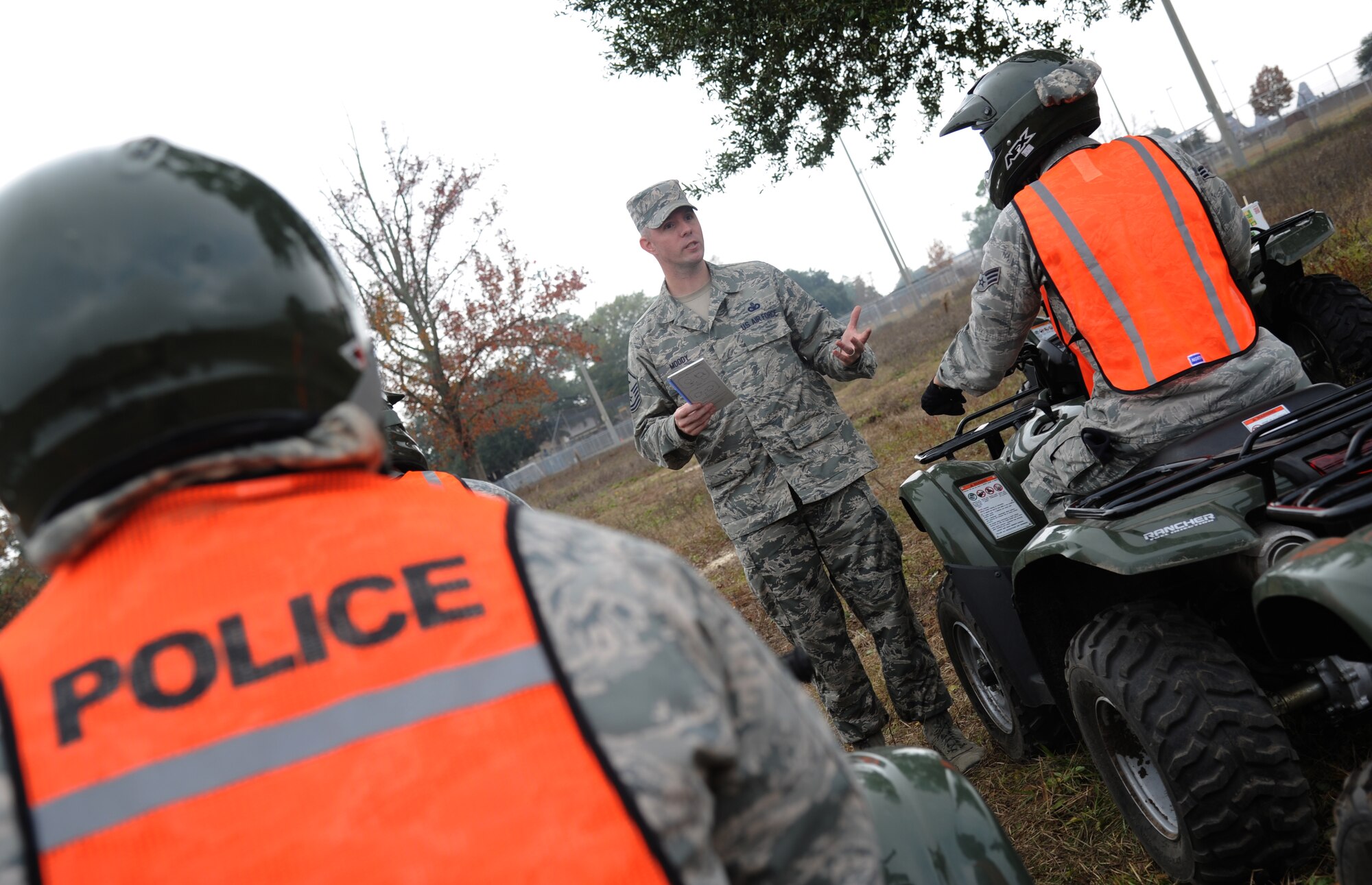 Master Sgt. Jeffrey Moody, 81st Wing Staff Agency first sergeant and course instructor, reviews the curriculum for the course with members of the 81st Security Forces Squadron, during a basic All Terrain Vehicle Rider Course Dec. 6, 2013, at Keesler Air Force Base, Miss.  The course, presented by the ATV Safety Institute, is designed to give riders the skills necessary to safely operate the vehicles and to react in an emergency situation.  The course began with a safety briefing and a physical inspection on the ATVs.  (U.S. Air Force photo by Kemberly Groue)