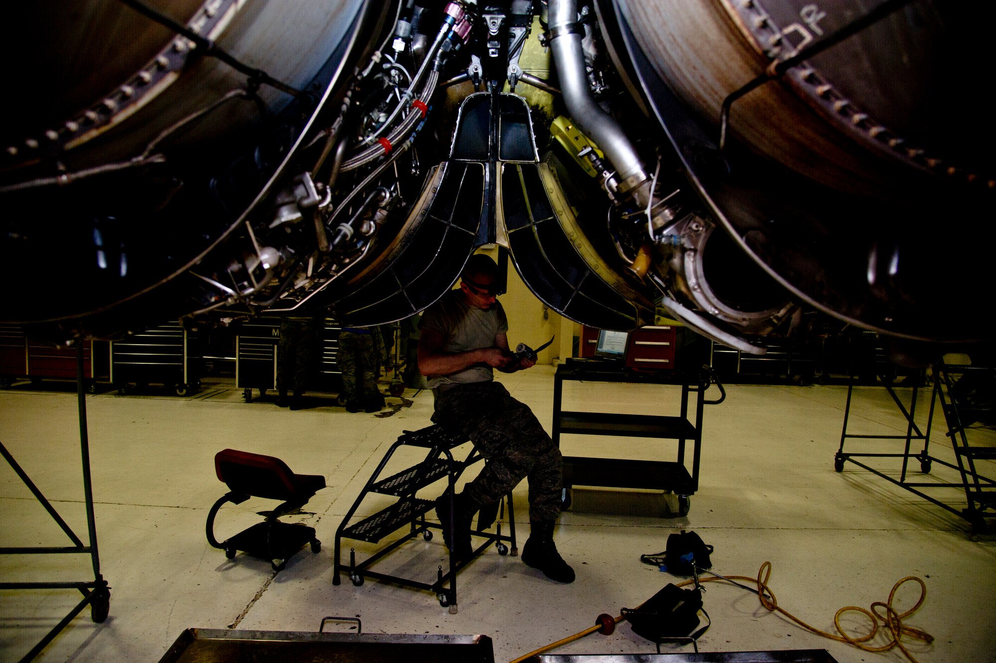 Airman 1st Class Michael Davis, 5th Maintenance Squadron aerospace technician applies safety wire to B-52H Stratofortress engines at Minot Air Force Base, N.D., Dec. 4, 2013. Keeping engines fully capable to carry out any task a pilot may carry out is what the propulsion flight does every day. The Airmen who work on these engines are fully trained and qualified to handle a multitude of procedures. (U.S. Air Force photo/Senior Airman Brittany Y. Auld)
