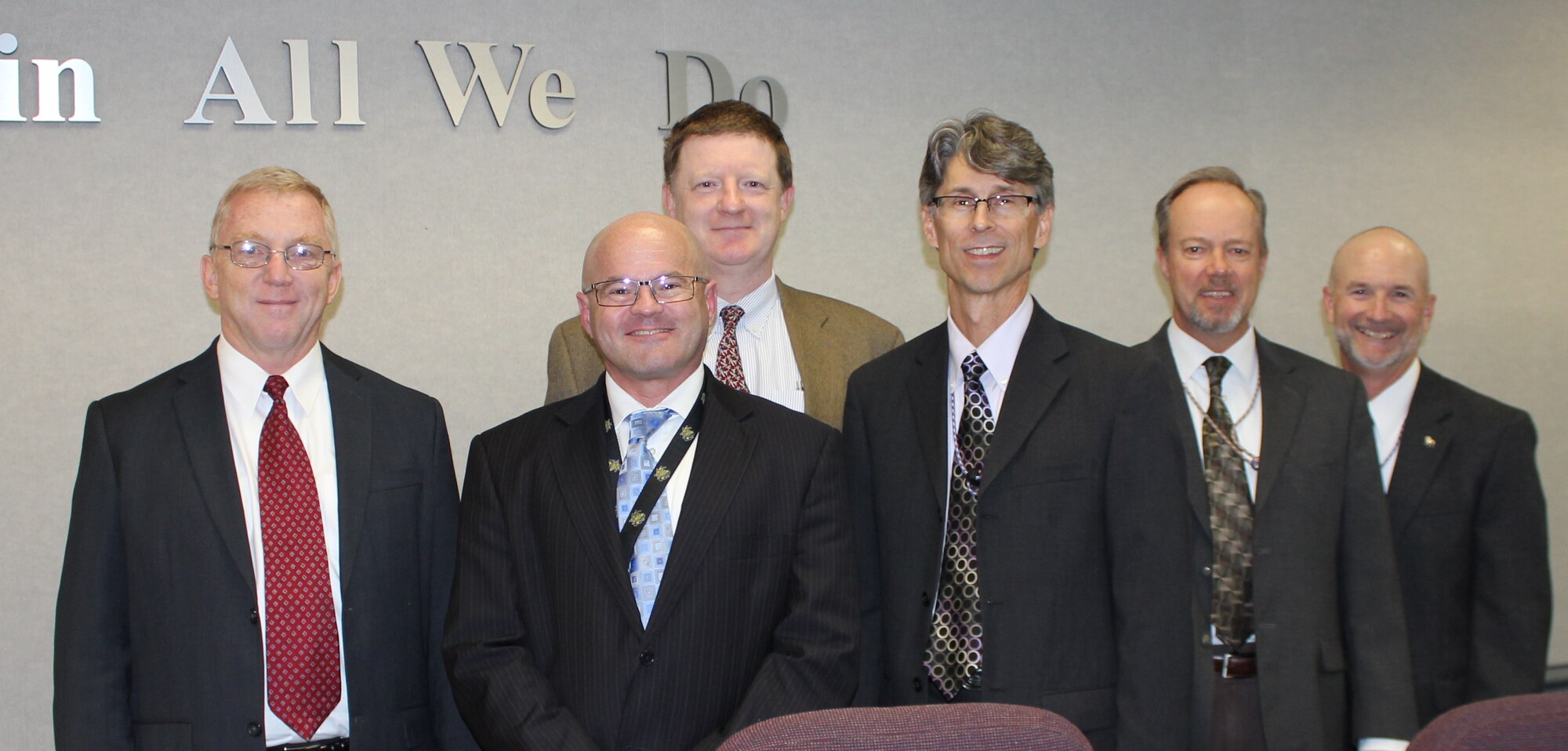 TYNDALL AIR FORCE BASE, FLA. -- Second from left, Federal Energy Management Program Director Tim Unruh visits AFCEC's Tyndall Detachment Nov. 21, to meet with leaders of the Energy Directorate. The group discussed energy savings performance contracts, FEMP training opportunities and energy reporting requirements, among other topics. Pictured from left: Ken Gray, Renewable Energy division chief; Unruh; David McGeown, FEMP; David Bek, Energy Director; Ken Gleason, Energy Program Development chief; and Les Martin, ESPC program manager.  (U.S. Air Force photo/Eddie Green)
