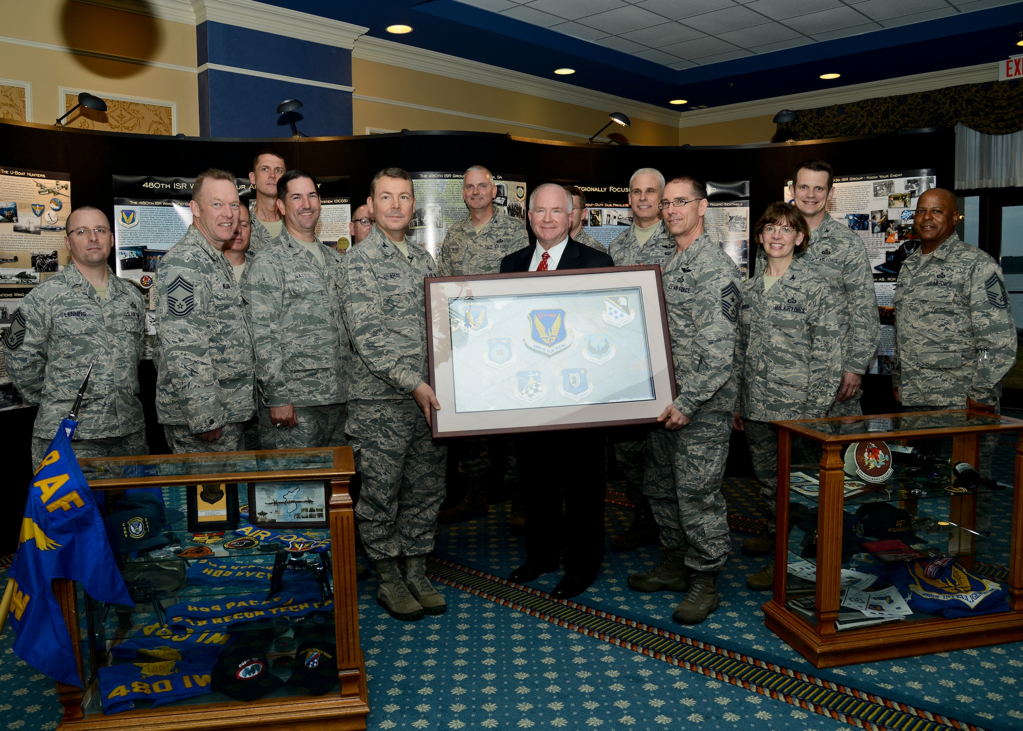 The 480th Intelligence, Surveillance and Reconnaissance Wing Heritage Observance Celebration event featured remarks by special guest and distinguished visitor, retired U.S. Air Force Brig. Gen. Larry K. Grundhauser, the first commander of the 480th ISR Wing, and a video presentation representing the wing. Three ISR Airmen also gave presentations which focused on their experience in a deployed environment that directly affected the mission on home soil. (U.S. Air Force photo by Airman 1st Class Victoria H. Taylor/Released)