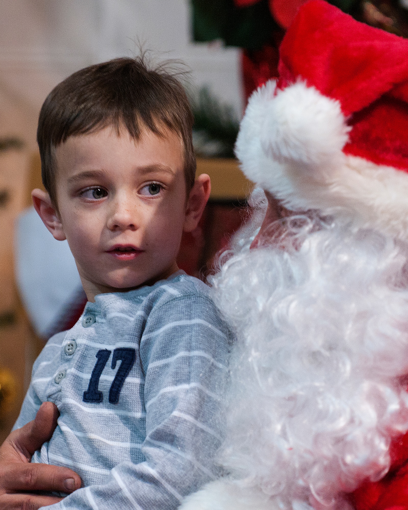Cooper Sanders, 4, son of Nicole and 2nd Lt. Cory Sanders, 90th Logistical Support Squadron, visits with Santa at the annual F.E. Warren Christmas tree lighting ceremony in the Fall Hall Community Center Dec. 6, 2013. (U.S. Air Force photo by R. J. Oriez)