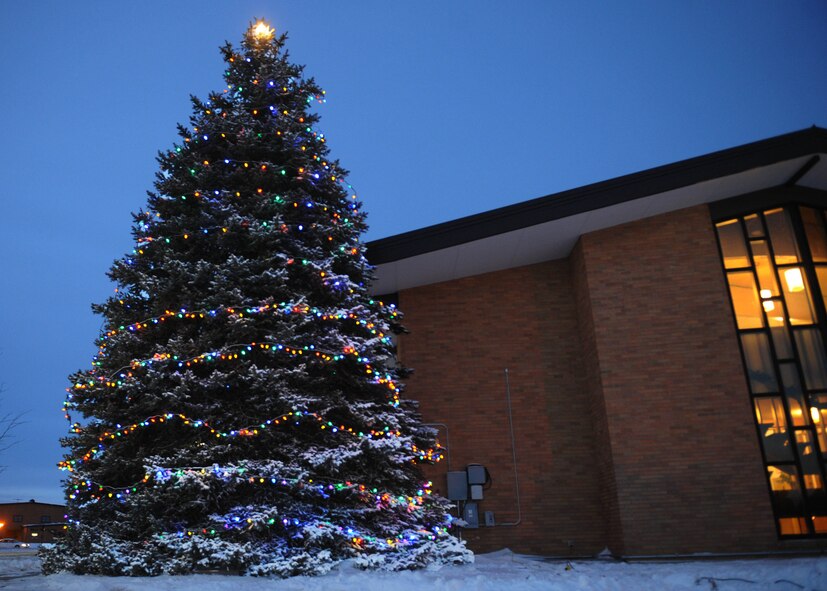 The base ushered in the holiday season during the 28th Bomb Wing tree lighting ceremony in front of the Freedom Chapel at Ellsworth Air Force Base, S.D, Dec. 4, 2013. The evening included remarks by Col. Kevin Kennedy, 28th BW commander, carolers, a visit from Santa Claus and holiday goodies. (U.S. Air Force Photo my Airman 1st Class Rebecca Imwalle / Released) 
