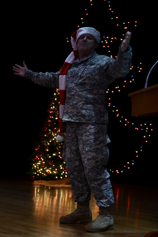 U.S. Army Maj. Gen. Ross Ridge, Initial Military Training Center of Excellence deputy commanding general, shouts “Merry Christmas” to the crowd during the Christmas tree lighting ceremony at Fort Eustis, Va., Dec. 6, 2013. The annual ceremony traditionally marks the start of the holiday season. (U.S. Air Force photo by Staff Sgt. Ciara Wymbs/Released)