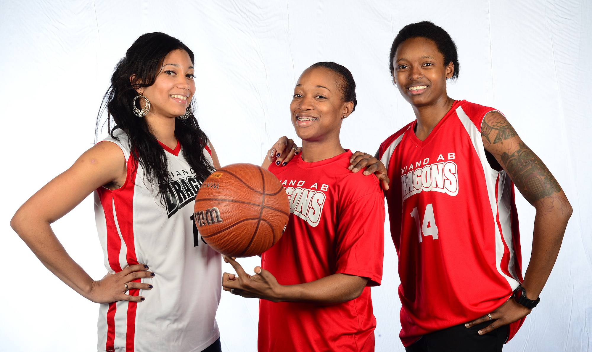 (From left) Yara Shannon, Ashley Pee and Brittany Williams, Aviano Women’s Basketball Team players, kicked off their season with a two point loss to the 31st Security Forces Squadron’s men over-30 team, Dec. 3, 2013, at Aviano Air Base, Italy. The team’s season will consist of scrimmages against local area teams, the men’s over-30 intramural league, three European tournaments and competing in the Armed Forces Championships. (U.S. Air Force photo/Senior Airman Matthew Lotz)