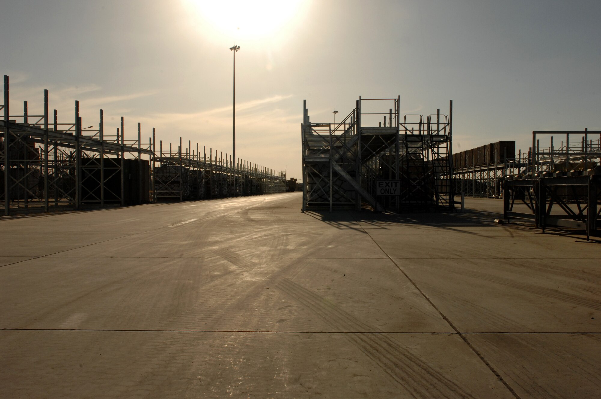 Equipment sits on the 451st Expeditionary Logistics Readiness Squadron cargo yard, Kandahar Airfield, Afghanistan, Dec. 9, 2013, awaiting transport ion to its final destination. Cargo is transported through KAF to several different destinations throughout Afghanistan and the world. (U.S. Air Force photo by Senior Airman Jack Sanders)
