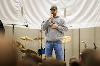 Washington Nationals first-baseman Adam LaRoche, talks with Soldiers, Sailors, Marines and DOD civilians during a USO show at Bagram, Afghanistan on Dec 9, 2013. The USO Holiday Tour brought a variety of celebrities on board, including reality television stars Willie and Jep Robertson from "Duck Dynasty," Washington Nationals first-baseman Adam LaRoche, comedian Nephew Tommy, pop singer Bridget Kelly, and actress Allison Haislip. DOD Photo by D. Myles Cullen Digital