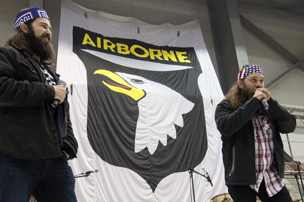 Television stars Willie Robertson and Jep Robertson from Duck Dynasty on A&E talk with Soldiers, Sailors, Marines and DOD civilians during a show at Bagram, Afghanistan on Dec 9, 2013. The USO Holiday Tour brought a variety of celebrities on board, including the Robertsons, Washington Nationals first-baseman Adam LaRoche, comedian Nephew Tommy, pop singer Bridget Kelly, and actress Allison Haislip. DOD Photo by D. Myles Cullen Digital