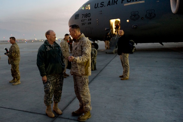 Chairman of the Joint Chiefs of Staff Gen Martin E. Dempsey and ISAF Commander Marine Gen. Joesph Dunford talk on the flight line of Bagram airfield, Afghanistan Dec 9, 2013. DOD Photo by D. Myles Cullen Digital