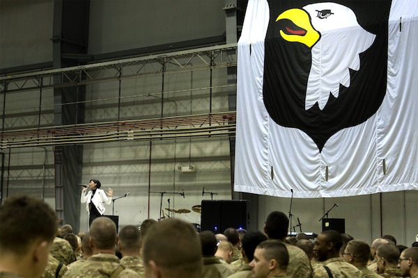 Chairman of the Joint Chiefs Gen Martin E. Dempsey and USO entertainers talk with Soldiers, Sailors, Marines and DOD civilians during a show at Bagram, Afghanistan on Dec 9, 2013. The USO Holiday Tour brought a variety of celebrities on board, including reality television stars Willie and Jep Robertson from "Duck Dynasty," Washington Nationals first-baseman Adam LaRoche, comedian Nephew Tommy, pop singer Bridget Kelly, and actress Allison Haislip. DOD Photo by D. Myles Cullen Digital