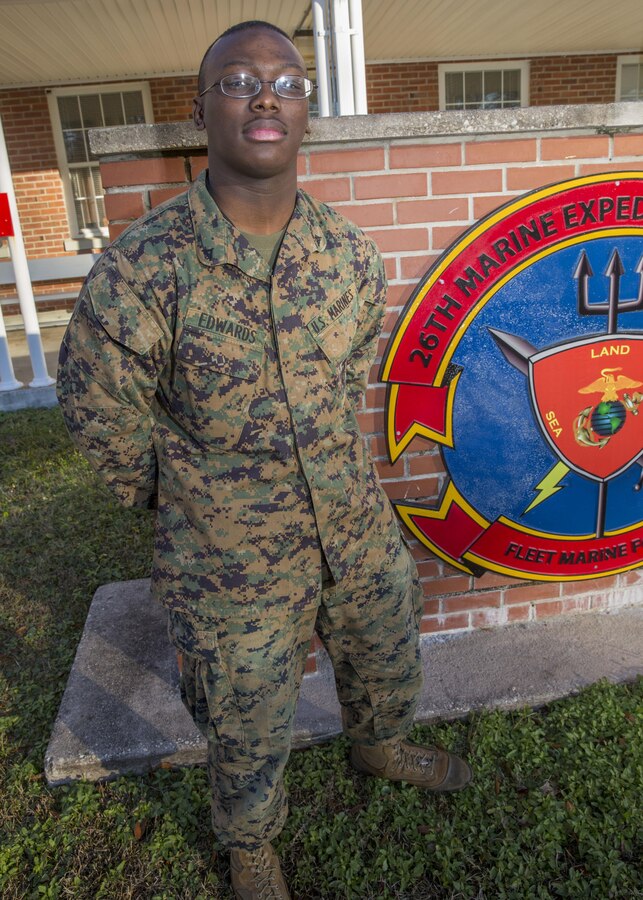 Lance Cpl. Tayevion Edwards, a forward observer with the 26th Marine Expeditionary Unit (MEU), and Cleveland native, poses for a photo outside the MEU's command post aboard Marine Corps Base Camp Lejeune, N.C., Dec. 11, 2013. Edwards embarked with the 26th MEU during its deployment in the Fifth and Sixth Fleet areas of operation. (U.S. Marine Corps Photo by Lance Cpl. Joshua W. Brown/Released)