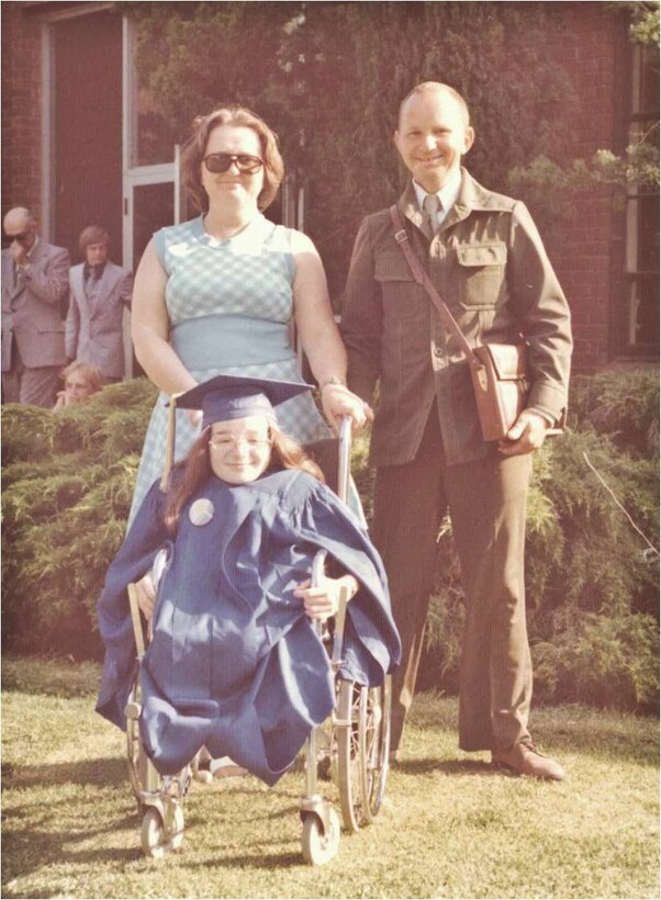 Ruth Johnson at her high school graduation. She is a proud high school and college graduate, just like any other graduate. She says people with Osteogenesis Imperfecta (OI) or “brittle bone” disease like her are like everyone else. They experience childhood, have friends, travel, and do many things.  They just do some things differently because of physical differences. “It’s about the person inside each of us,” she said.