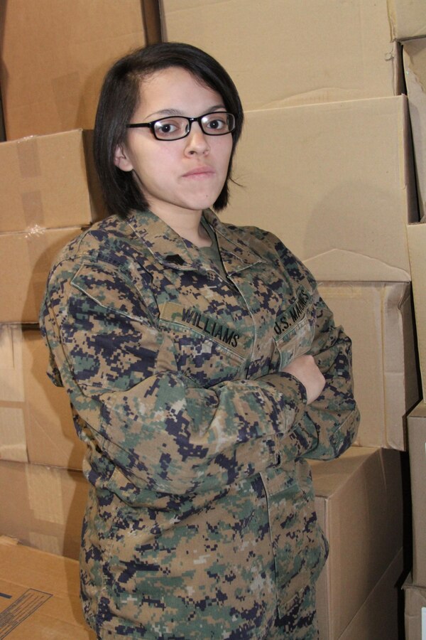 Recruiting Station Frederick’s logistics clerk, U.S. Marine Corps Sgt. Donna Williams, took some time out to show off her warehouse. She was selected as the 4th Marine Corps Districts Marine of the Year.  (U.S. Marine Corps photo by Sgt. Amber Williams/Released)