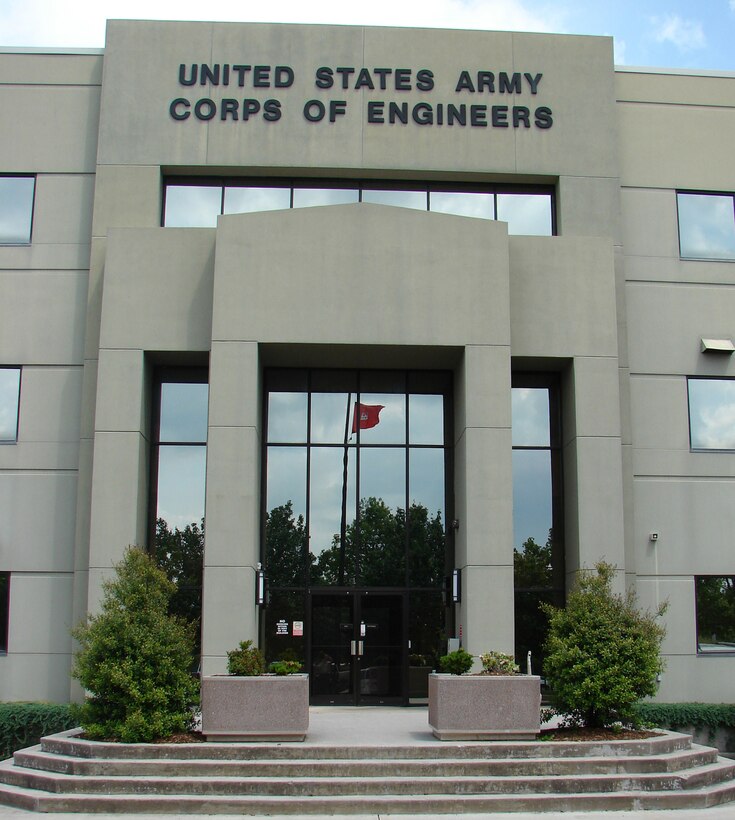 The main entrance at the U.S. Army Engineering and Support Center building on University Square in Huntsville, Ala. In 1995, the Corps redesignated Huntsville Division, calling it the “U.S. Army Engineering and Support Center.” That same
year, Huntsville Center moved into its new
office on University Square