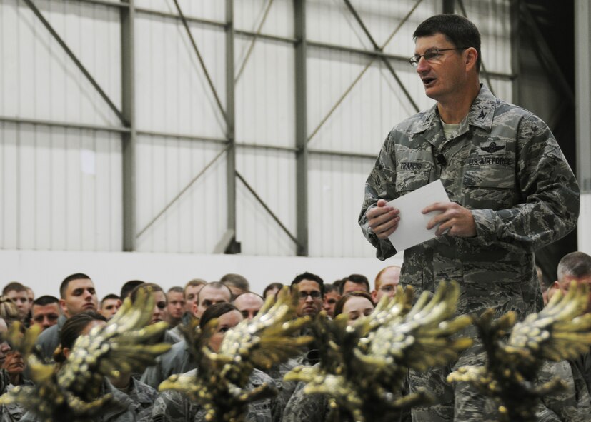 Col. Michael Francis, 131st Bomb Wing commander, Missouri Air National Guard, addresses the wing at the 2013 year-end all call Dec 8, at Whiteman Air Force Base, Mo. Francis discussed the achievements of the past year and outlined his vision for the next. (U.S. Air National Guard photo by Airman 1st Class Nathan Dampf/RELEASED)