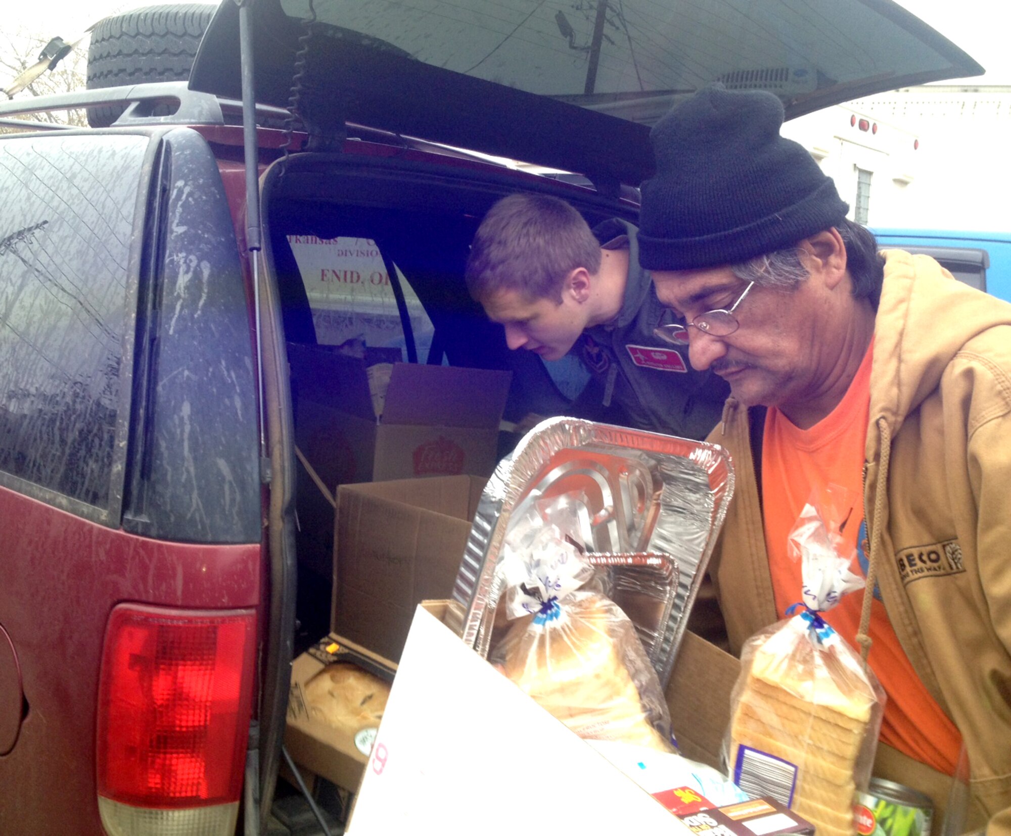 Food collected during a Thanksgiving food drive, organized by Capt. Julia Mahaffey, is delivered to the Salvation Army in Enid. (U.S. Air Force photo/ Senior Airman Frank Casciotta)