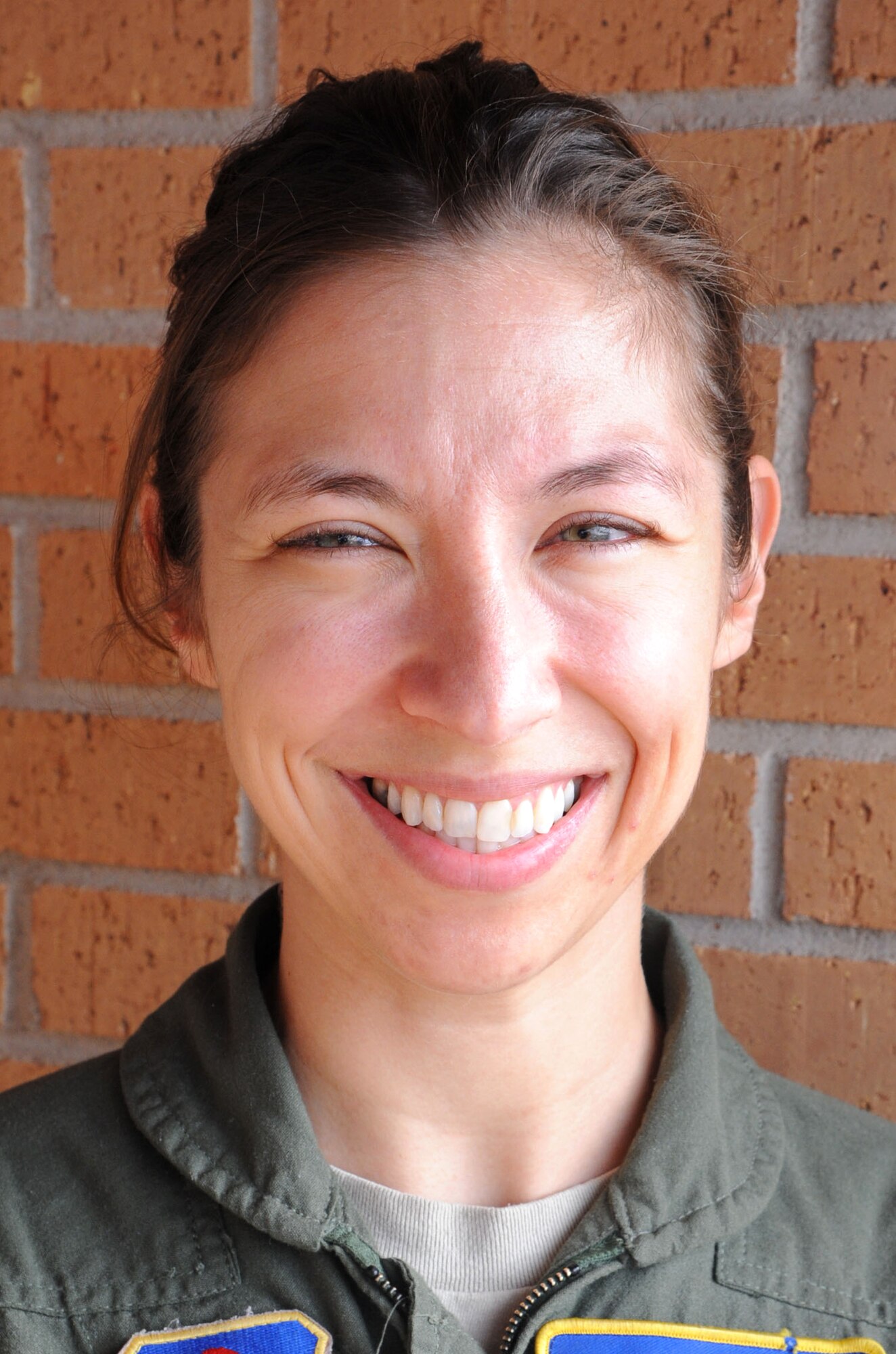 Capt. Julia Mahaffey, an instructor pilot with the 3rd Flying Training Squadron, organized a food drive that provided Thanksgiving feasts for 29 local families. (U.S. Air Force photo/ Senior Airman Frank Casciotta)