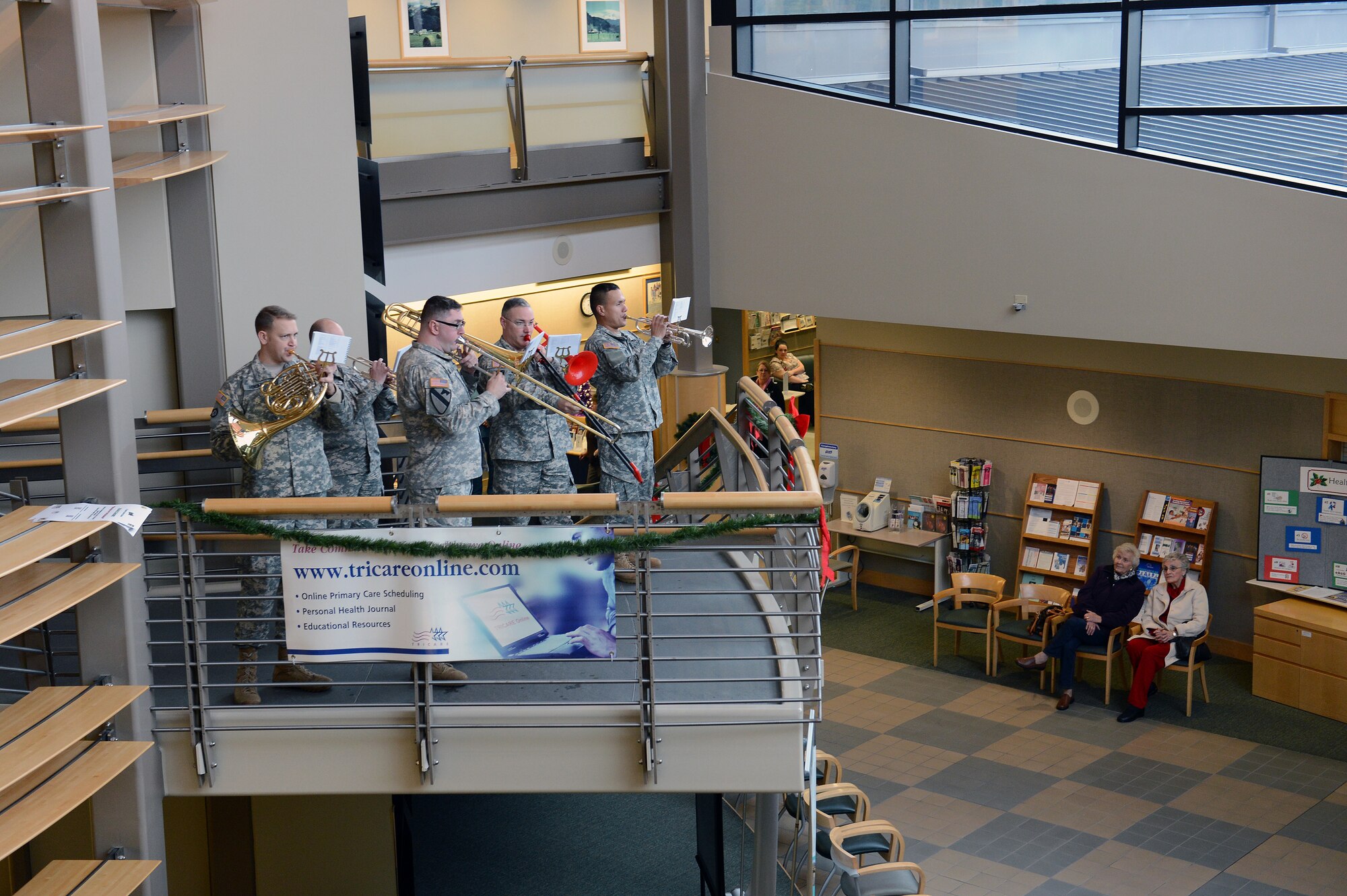 The I-Corp Army Band brass quintet plays a Christmas carol at the Airman’s Clinic, Dec. 10, 2013 at Joint Base Lewis-McChord, Wash. The band played a variety of popular Christmas songs and took requests from audience members. (U.S. Air Force Photo/Airman 1st Class Jacob Jimenez) 