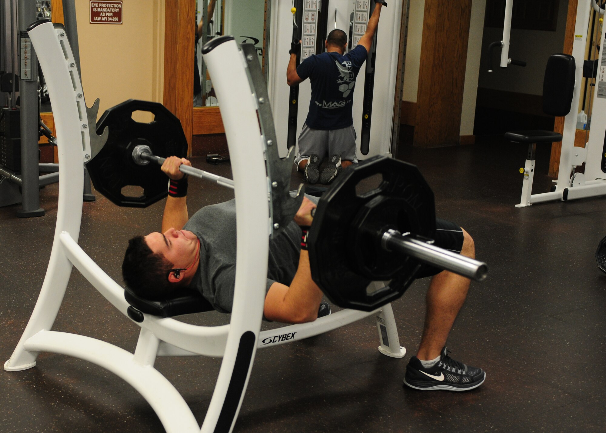 Airman 1st Class Trevor Soto, 9th Security Forces Squadron member, warms up for Beale’s Best Competition at the Harris Fitness Center Dec. 10, 2013. The competition consists of one repitition max bench press, one repitition max squat and a 5k run. (U.S. Air Force photo by Senior Airman Allen Pollard/Released)