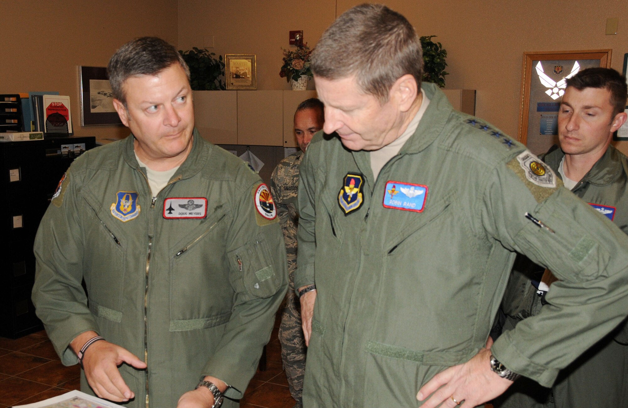 Lt. Col. Douglas Meyers, 944th Operations Group deputy commander explains the way ahead plan for the unit to Gen. Robin Rand, Air Education and Training Command Commander, during his visit to the 944th Fighter Wing. (U.S. Air Force photo/Tech. Sgt. Louis Vega Jr.)
